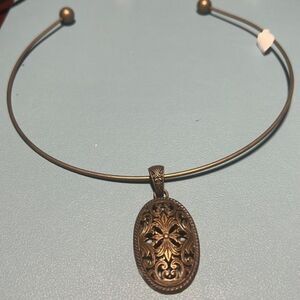 Handcrafted antique gold tone pendant on choker